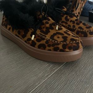 Leopard print house shoe.